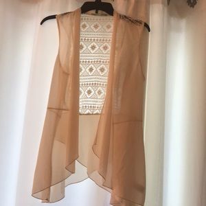 Gorgeous cream sheer vest with lace embellishment!